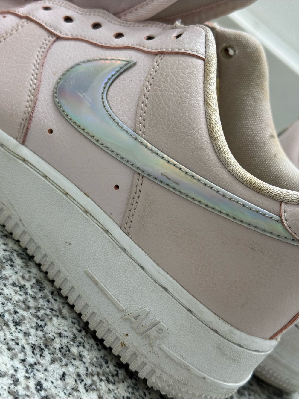 Nike Women's Light Pink Low-Top Sneakers with Iridescent Swoosh